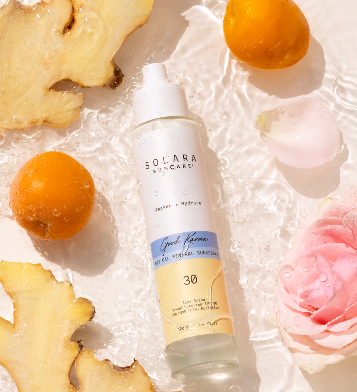 Ginseng, Ginger Root, and Camellia Seed Oil ingredients in Good Karma SPF mist; bright citrus scent awakens the senses and transports you to summer in Europe; broad spectrum mineral SPF